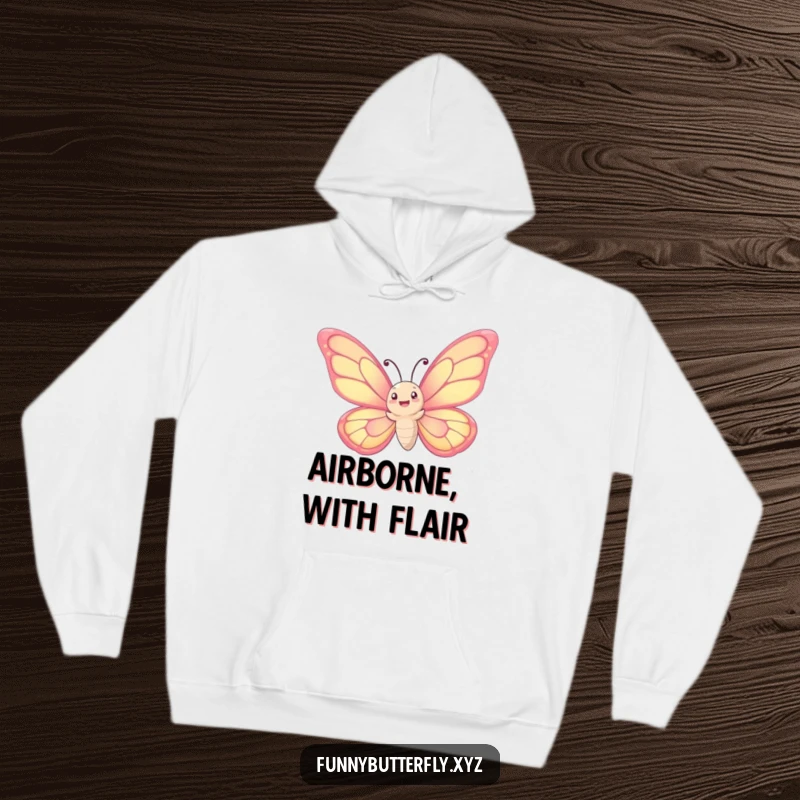 Funny hoodie: A whimsical butterfly with enormous wings joyfully spirals upwards into the sky, depicting a beautiful ascent.