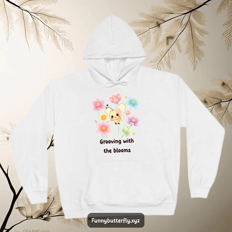 Cozy hoodie featuring a tiny, funny butterfly with a cheerful expression dancing joyfully among colorful flower petals.