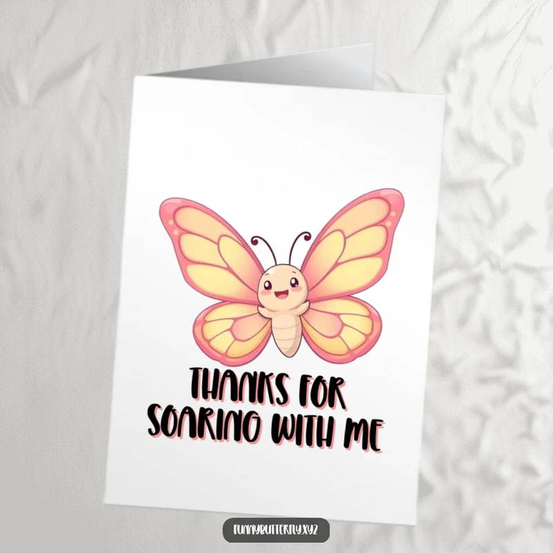 Free Printable Thank You Card: Whimsical butterfly with large wings spiraling upwards, delivering thanks gracefully.
