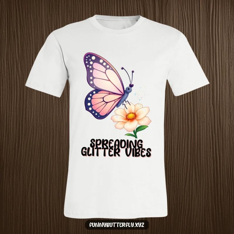 Funny T-shirt: A butterfly artistically sprinkles shimmering dust from its wings onto a flower, depicting a whimsical act of creation.